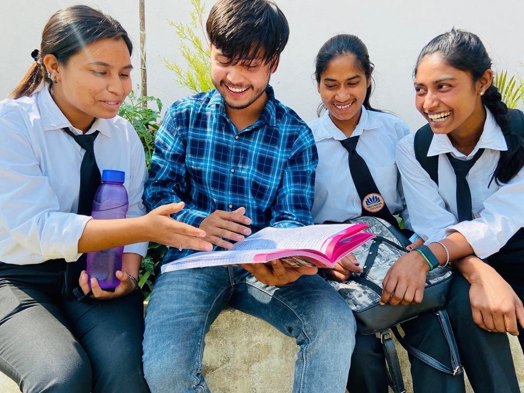 Students studying together on campus